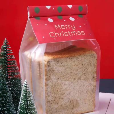 China Recyclable Red Christmas Cotton Paper Sack Flat Bottom Bag With Tin Tie And Clear Window for sale