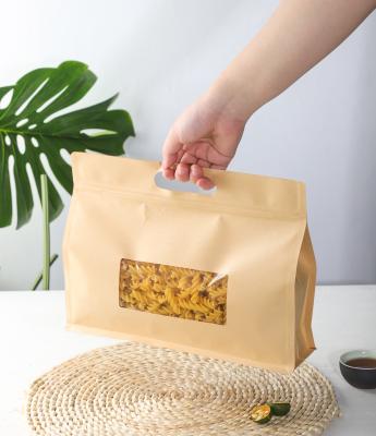 China Recyclable Wholesale Kraft Paper Bag With Window And Handles For Tea Nut Snack for sale