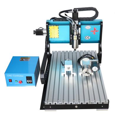 China Garment Shop Mini 4 Axis Rotary Wood Engraving Working Carving Machine Router CNC 6040 for sale