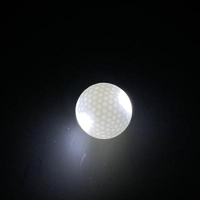 China Custom Golf Game Or Practice Logo Printing Night Light Up Glow Electronic LED Golf Balls for sale