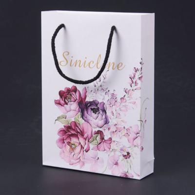 China Small recyclable decorative paper bags for gifts for sale