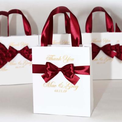 China Boutique Paper Bag Recyclable Hot Stamping Chinese Bride and Groom Wedding Gift Mini Bag For Guest for sale