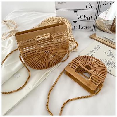 China Natural Bamboo Woven Bag Women Tote BagFashion Handwoven Straw Handle Beach Clutch Evening Bag New Hollow Purses for sale