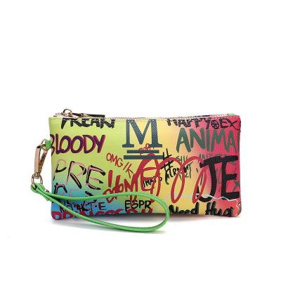 China The 2021 hot color Fasion wallet graffiti brands wallet waterproof design women's wrist famous women's wallets for sale