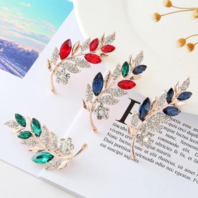 China Europe Leaf Design Stock Diamond Dubai Suit Lapel Pin Badge for sale