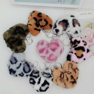 China Smooth Outdoor Fashion Leopard Series Bag Accessories Cheap Pom Pom Pom Heart for sale