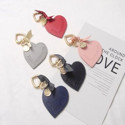 China Fashion Design Fashion Bags Accessories Car Key Heart Shape Logo Luxury PU Leather Key Chain for sale