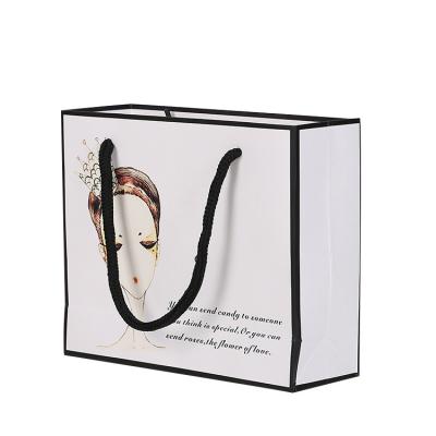 China Wholesale Hot Sale Luxury Shopping Packaging Gift Bags Rope Paper Handle Recyclable With Logo Print for sale