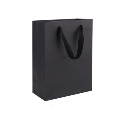 China Recyclable Luxury Black Kraft Paper Shopping Bag Custom Printed Paper Gift Bags With Handles for sale