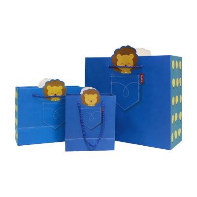 China Recyclable Hot Sale Cartoon Paper Tote Bag Blue Cute Paper Bag With Three Strand Rope for sale