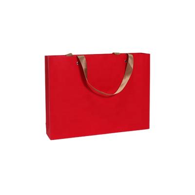 China Factory direct sale logo recyclable custom paper bag for boutique tote bag with rivet threaded rope for sale