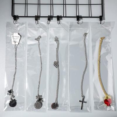 China Bracelets Rings Disposable Opp Bag With Header Necklaces Opp Plastic Packaging Bag for sale