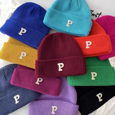 China COMMON Custom Winter Hats Woman Knitted Beanie Hat Custom Logo Embroidery Knitted Hat for sale