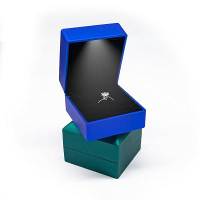 China Fashionable Small led ring boxes jewelry packaging box custom logo plastic bracelet package box for jewelry with led light for sale