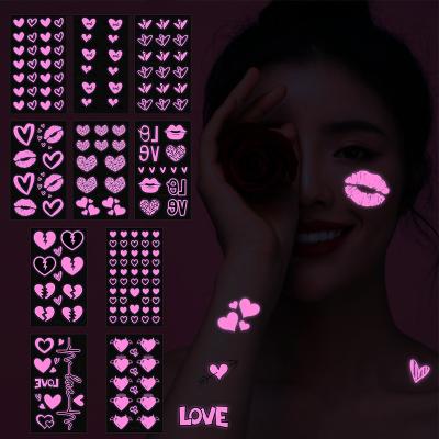 China Temporary UV neon temporary tattoos Pink heart shaped shimmer designs love glow in the dark tattoo stickers body face art for sale