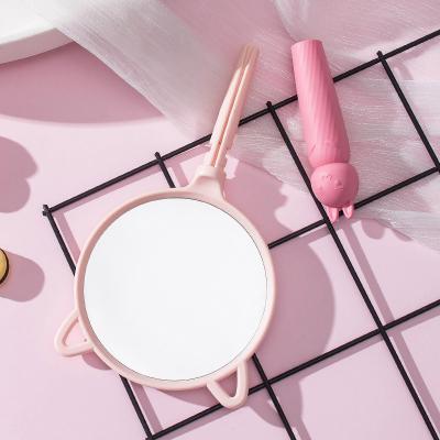 China Not Specified Travel creative makeup mirror handheld cosmetic mirror cat ear styling tool handle cat paw mirrors for sale