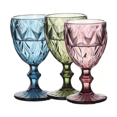 China Home Bar Hotel Restaurant Customized Party and Wedding High Quality Colored Fancy Thick-Necked Fancy Machine Embossed Wine Glass Tumbler Goblets for sale