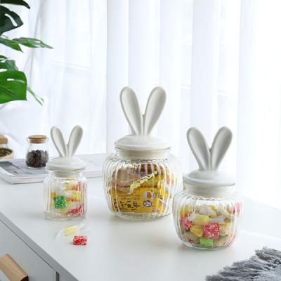 China OEM Stocked Wholesale High Quality Set of 3 Rabbits Head Lid Candy Clear Glass Jar for Kitchen Use for sale