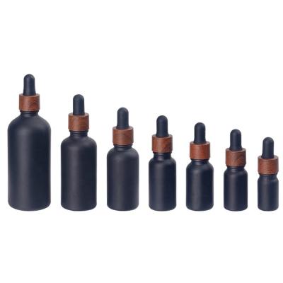 China 5ml 20ml 25ml 10ml 30ml 50ml 100ml Essential Oil Bottles Black Glass Bottle Cheap Price Premium Quality Cosmetic Dropper Bottles Manufacturer for sale