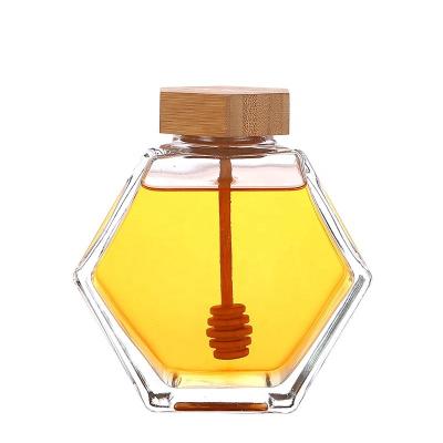 China Food Manufacturer Free Samples 100ml 180ml 220ml 380ml Honey Jars With Lid Bamboo Honey Jar Exagon for sale