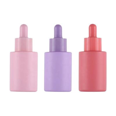 China 30ml thickness pink bottom glass serum bottle cosmetic packaging bottles manufacturer for serum cheap price premium quality for sale