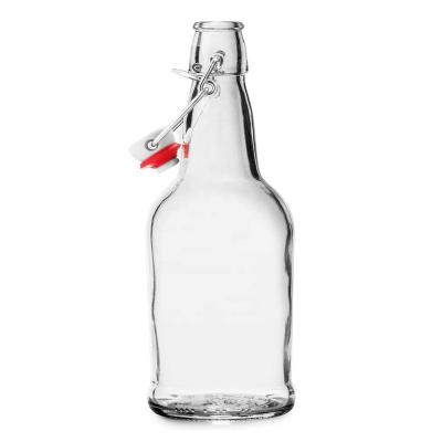 China Beverage Maker Flip Top Clear Kombucha Bottles 500ml Glass Kombucha Bottles For Beverage, Beer, Soda, Kefir Non Leaking for sale