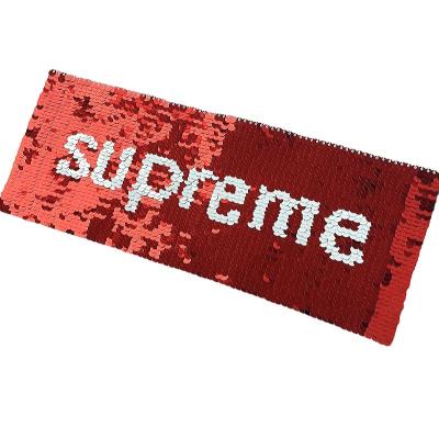 China 3D Dress Accessories Custom Embroidered Reversible Sequins Patch Superman Clothes for sale