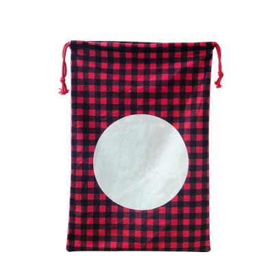 China Chinese Style Sublimation Printed Santa Bag Canvas Black Drawstring Grid Santa Bag Red North Pole Express for sale