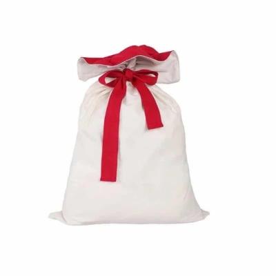 China Popular Christmas Gift Red and White Canvas Christmas Gift Drawstring Bag Blank Sublimation Santa Bag Customize for sale