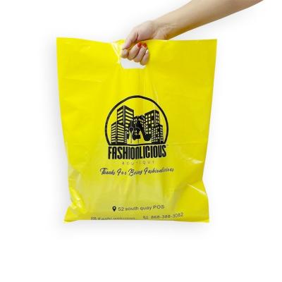 China Custom Handle Moisture Proof Plastic Bags Logo Printed Clothing Bag Packaging for sale