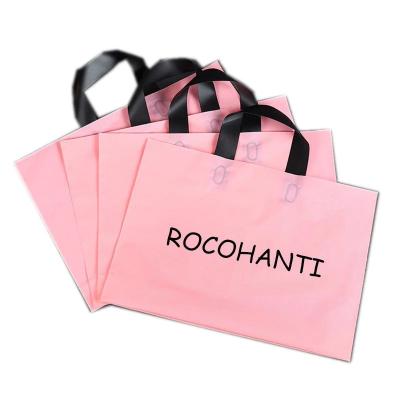 China Moisture Proof Custom Plastic Tote Bags Logo Printed Clothing Bag Packaging With Handle for sale