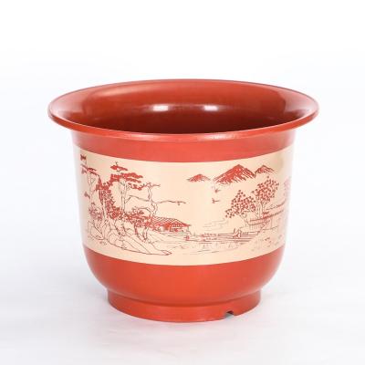 China Modern Clay Flower Pots Face Flower Pots Self Watering Flower Pots for sale