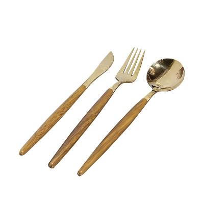 China Sustainable Portable flat head stainless steel wooden handle Western style steak knife spoon and fork tableware set for sale