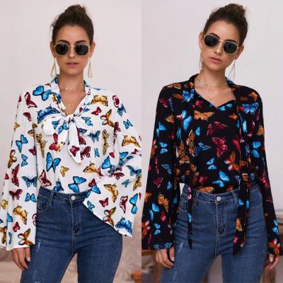 China Anti-wrinkle fashion printed flare sleeve bow tie women blouse top OC22 for sale