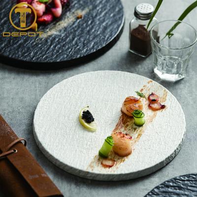 China New Arrival White Ceramic Round Pizza Dishes Design Porcelain Stocked Creative Dish for sale