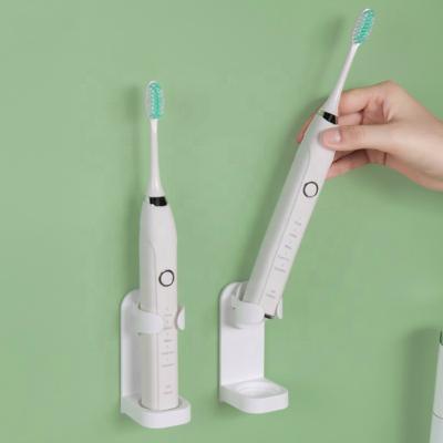 China Modern Electric Toothbrush Storage Rack Stick Waterproof Wall Mounted Toothbrushes Drain Rack Bathroom Storage Holders for sale