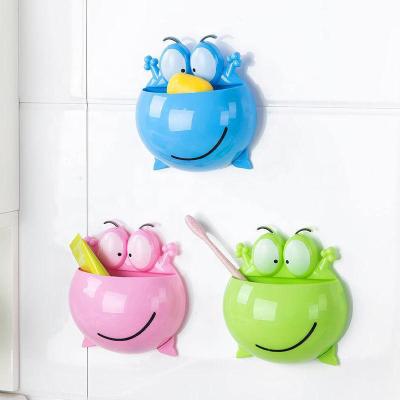 China Viable Cute Cartoon Frog Toothbrush Holder Kids Toothbrushes Storage For Bathroom Suction Cup Toothpaste Holder Rack for sale