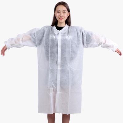 China Breathable Comfortable Stock Blue Disposable Nonwoven Lab Coat For Dental Clinic Fast Delivery for sale