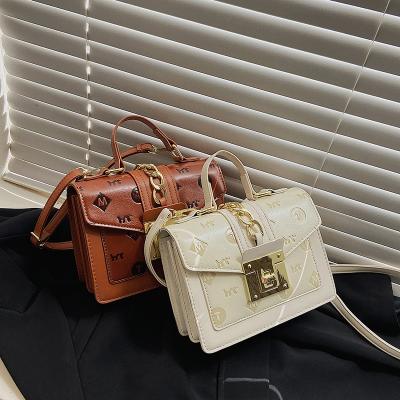 China Latest Fashion Women Cross - Body Bag Durable PU Leather Debossed Clutch Purse With Chain Design Handbag Shoulder Messenger Bag For Lady for sale