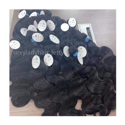 China Blue Tape Soft Non Remy Malaysian Brazilian Hair 10-30 Inch Virgin Hair Mink Hair Weave Bundles for sale