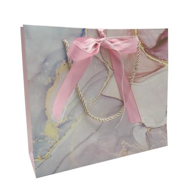 China Wholesale Customm Recyclable Present Hard Paper Bag Recyclable Gift Shopping Bags Business Logo Pink Kraft Paper Bag for sale