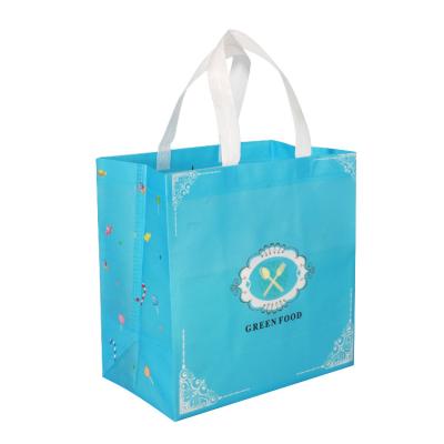 China Large Capacity Blue Handled Custom Logo Printed Nonwoven Shopping Tote Bags Eco Friendly for sale