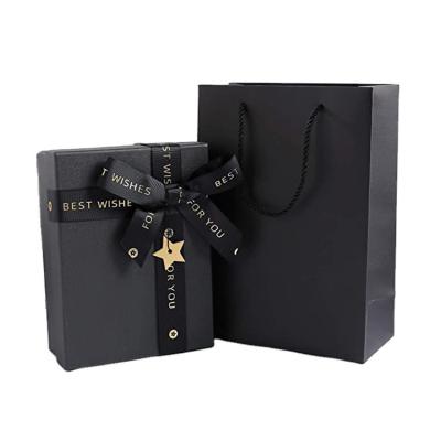 China Recyclable Recycled Customized Printed Black Paper Shopping Bag With Handle for sale