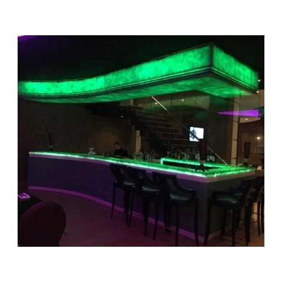 China Durable Green Onyx Stone Bar Curved Indoor Front Bar Counter Design Beer Club for sale