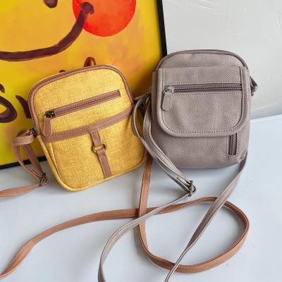 China Fashion Small Canvas One-Shoulder Cross - Body Bag Outdoor Casual Backpack Style Men's And Women's Travel Bags Retro for sale