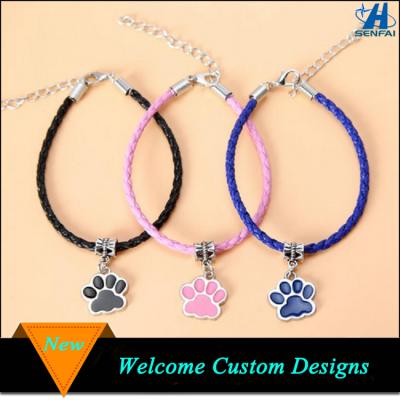 China Fashionable Promotional Wholesale Custom Paw Print Charm Leather Braided Bracelet for sale