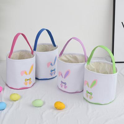 China 100% Eco-Friendly Rabbits Paw Basket Easter Party Supplies Bunny Ear Eggs Hunting Gift Bag Happy Easters Decorations for sale