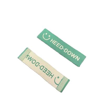 China Washable Wholesale Custom Embossed Logo Brand Fabric Labels Labels For Clothing for sale