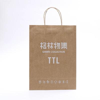 China Recyclable Custom Luxury Craft Paper Bag Shopping Packaging With Your Own Logo for sale