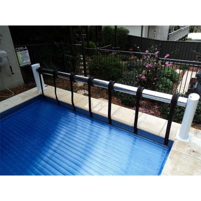 China Retractable Waterproof PE Fabric Swimming Pool Cover Automatic Inflatable Swimming Pool Cover Winter Swimming Pool Cover for sale